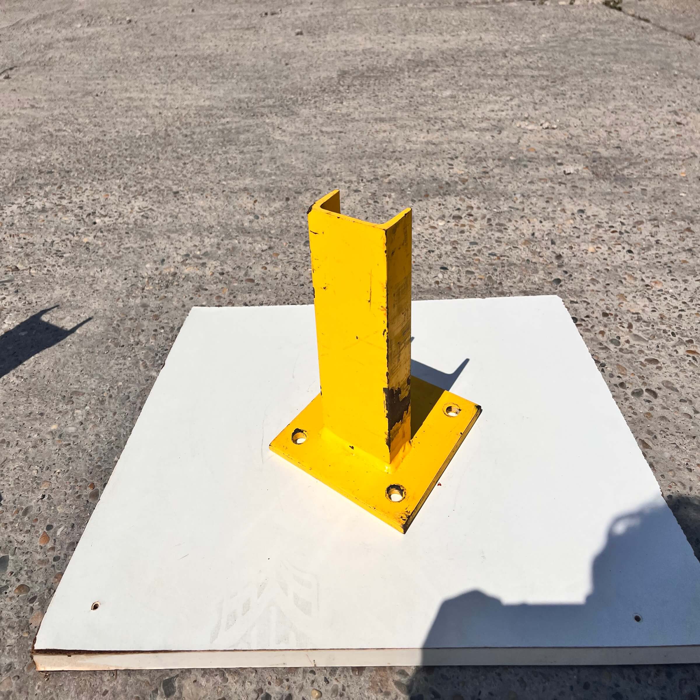 Yellow U-shaped post